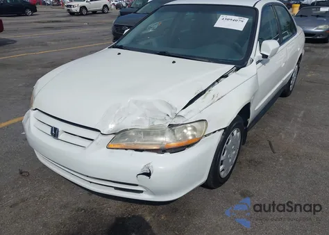 2001 Honda Accord 2.3 Lx from USA, damaged, VIN 1HGCG56401A058638